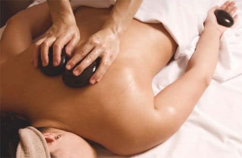 Hot stone massage therapy with Bodyworkz in Gilbert, Arizona