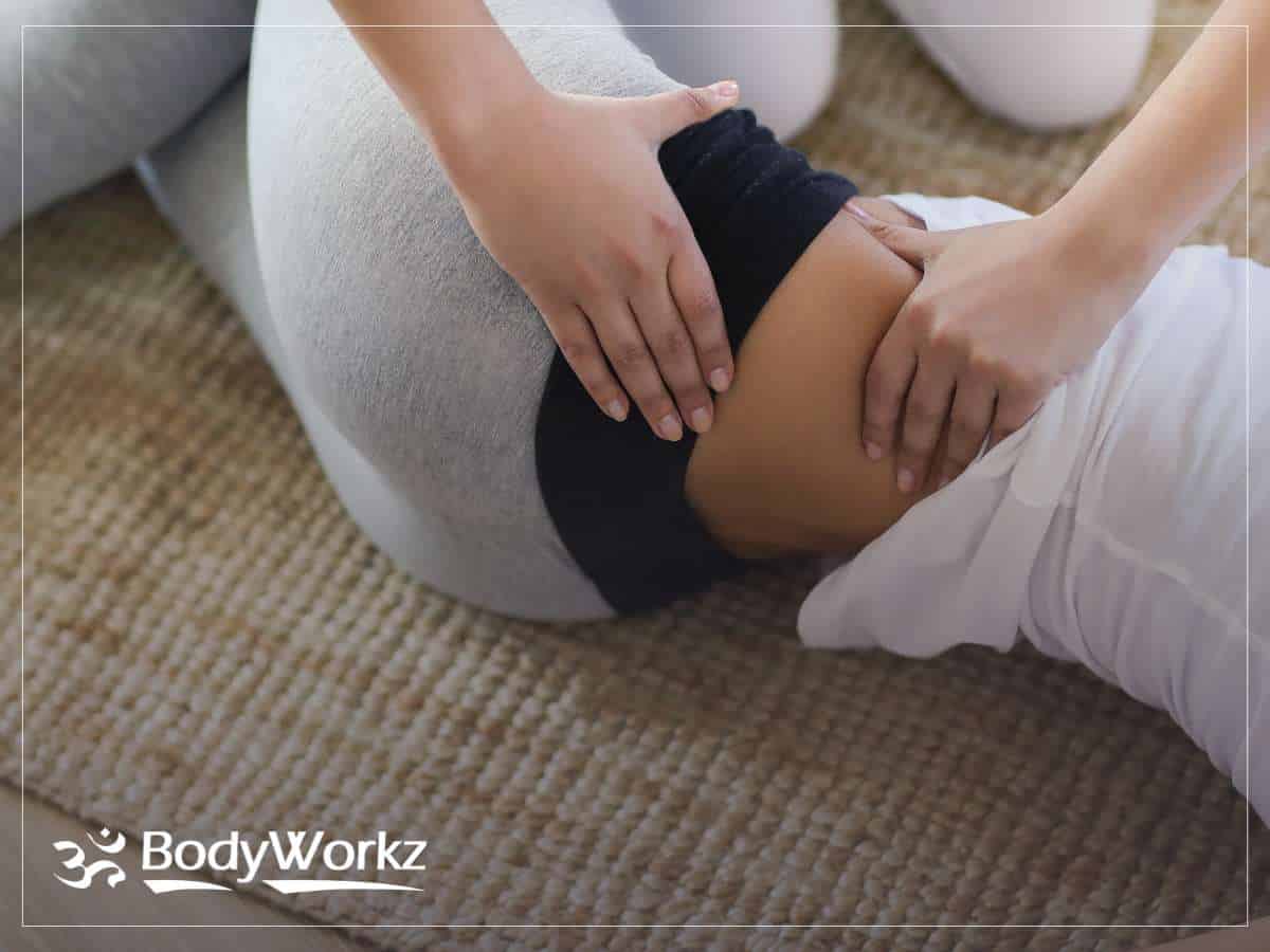 Therapist providing treatment for sciatica pain relief