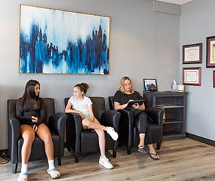 Inviting waiting room atmosphere at BodyWorkz chiropractic facility