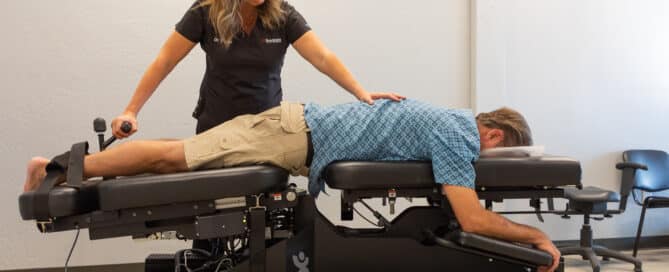 Chiropractor providing gentle care to a patient at BodyWorkz