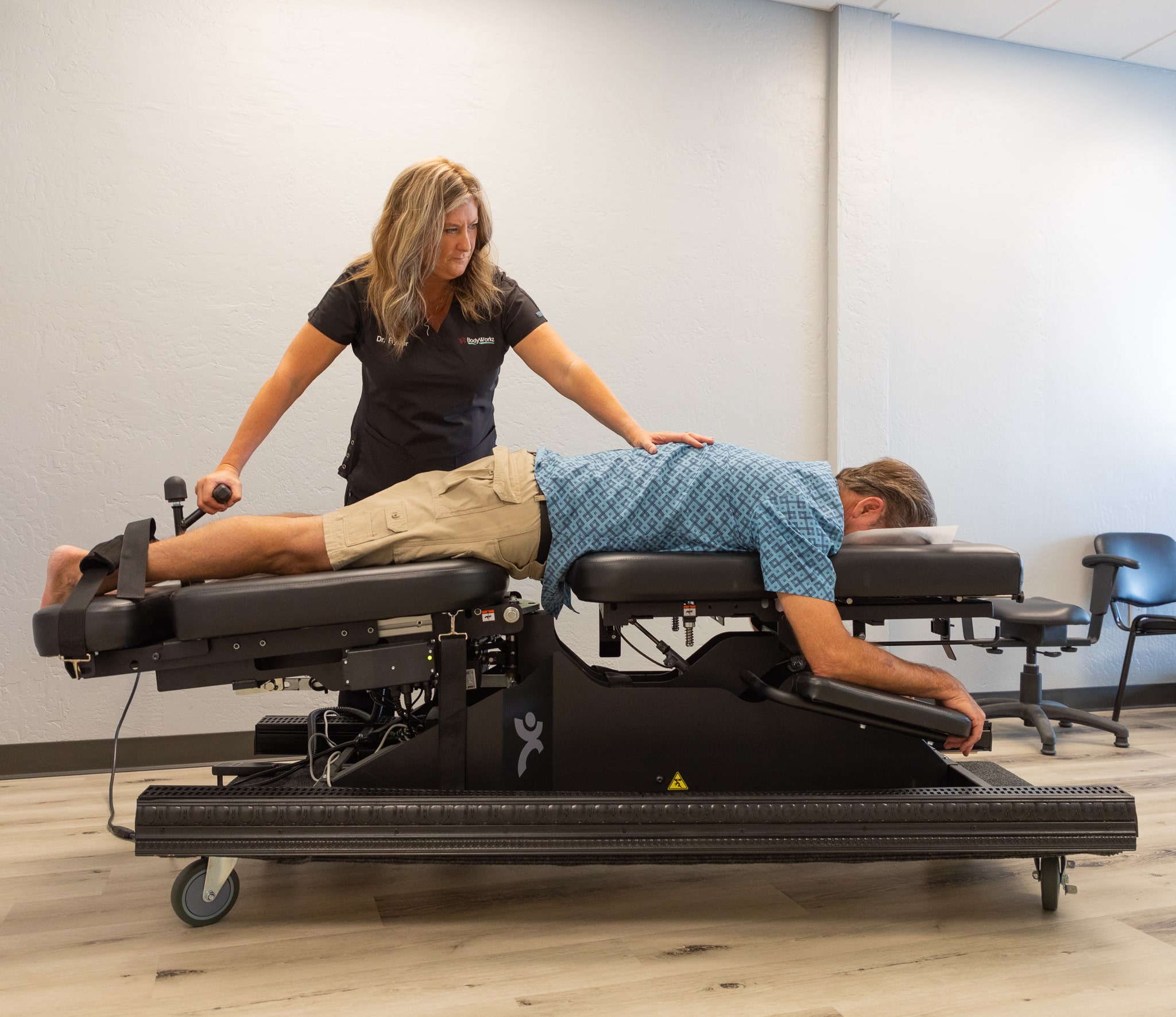 Chiropractor providing gentle care to a patient at BodyWorkz
